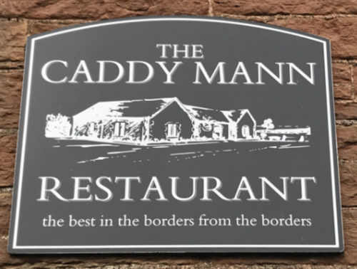 Caddy Mann Sign